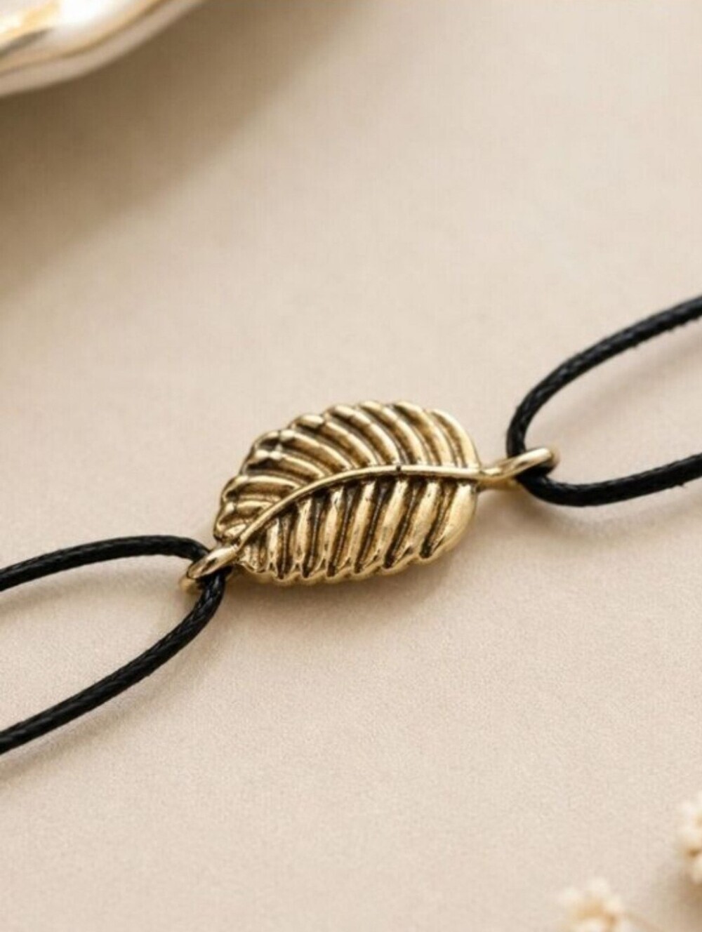 Delicate Black Cord Bracelet with Gold Leaf Accent